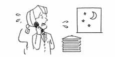 夜間に電話対応するスタッフのイラスト